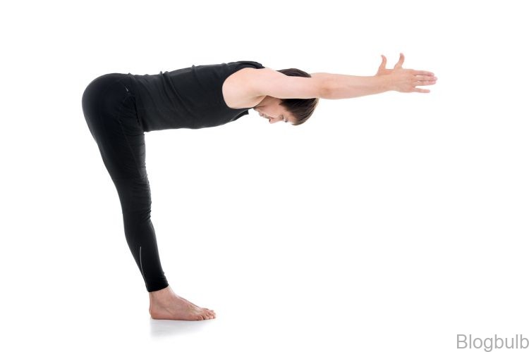 standing forward bend 1 10 best yoga poses for inguinal hernia and other abdominal issues 10 Best Yoga Poses For Inguinal Hernia And Other Abdominal Issues